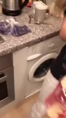 girl blowing on periscope after teasing boyfriend in the kitchen - Hotscope