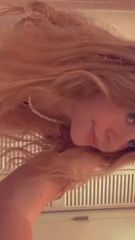 Hot blonde playing with her ass